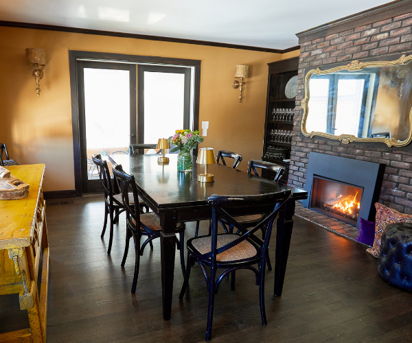 Farmhouse Kitchen + Bar Dining Area Fireplace